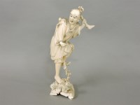 Lot 131 - A Japanese carved ivory figure