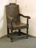 Lot 555 - A 17th century style wainscot chair