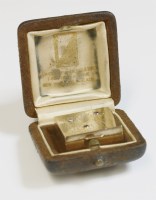 Lot 497 - A cased sapphire and diamond hinged box