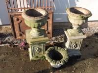 Lot 588 - A pair of reconstituted urns and stands