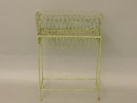 Lot 473 - A wire planter and stand