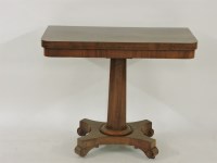 Lot 556 - A Victorian plum pudding mahogany card table
