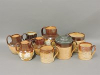 Lot 239 - Five Doulton two tone stoneware jugs