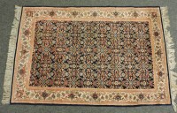 Lot 535 - A large wool rug