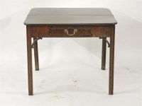 Lot 480 - A George III mahogany fold over tea table
