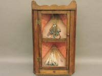 Lot 365 - A glazed corner cabinet