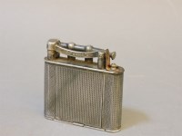 Lot 74 - A 1930s Dunhill silver plated ladies combination lighter