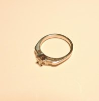 Lot 212 - An 18ct white gold single stone princess cut diamond ring