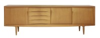 Lot 574 - A Danish teak long sideboard