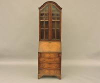 Lot 1794 - A 1930s walnut bureau bookcase