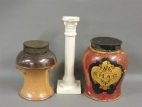 Lot 233 - An unusual pottery tobacco jar and cover