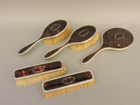 Lot 67 - A tortoiseshell and silver five piece dressing set