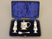 Lot 126 - A silver cased condiment set