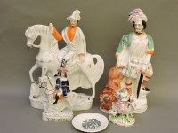 Lot 246 - Two large Victorian Staffordshire figures