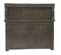 Lot 583 - A 17th century joined oak press cupboard