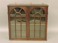 Lot 472 - An 18th century oak bookcase cabinet