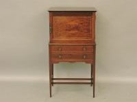 Lot 542 - An Edwardian inlaid mahogany music cabinet