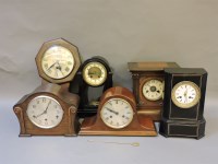 Lot 276 - Two Victorian ebonised two train mantel clocks