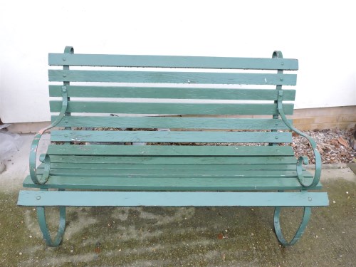 Lot 600 - A wrought iron garden bench