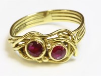 Lot 32 - An 18ct gold two stone ruby ring by Susan Wright