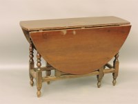 Lot 594 - An 18th century mahogany gateleg table