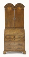 Lot 567 - An 18th century and later walnut bureau bookcase