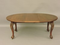 Lot 589 - A 1920s Chippendale style mahogany extending table