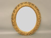 Lot 475 - A 20th century oval mirror