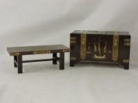 Lot 555 - An Eastern hardwood and brass bound chest