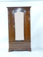 Lot 571 - An Edwardian inlaid wardrobe