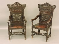 Lot 488 - A pair of late 19th/early 20th century carved oak wainscot chairs