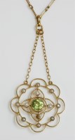Lot 3 - An Edwardian peridot and split pearl gold pendant