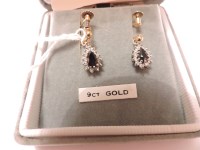 Lot 31 - A pair of sapphire and diamond drop earrings