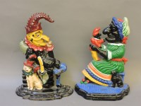 Lot 225 - A pair of cast iron and painted Punch and Judy door porters