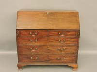 Lot 483 - A Georgian mahogany bureau