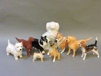 Lot 308 - Nine Beswick and Royal Doulton figures of dogs