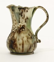Lot 24 - A Whieldon-type pottery baluster Cream Jug