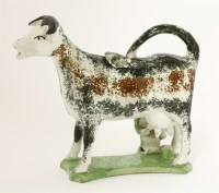 Lot 33 - A Cow Creamer and Cover