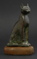 Lot 65 - An Egyptian bronze figure of a seated cat