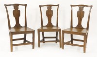 Lot 445 - A pair of Georgian Provincial Chippendale hall chairs