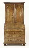 Lot 477 - A George II burr walnut bureau bookcase