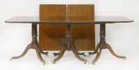 Lot 489 - A mahogany three-pillar dining table