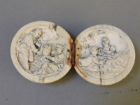 Lot 56 - A 19th century French carved ivory diptych ball