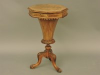 Lot 545 - A Victorian walnut octagonal work table