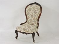 Lot 550 - A Victorian walnut salon chair