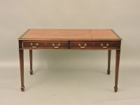 Lot 538 - A reproduction mahogany writing table