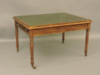 Lot 550 - An early 19th century mahogany four drawer writing table