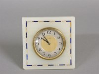 Lot 346 - An Art Deco alabaster strut clock