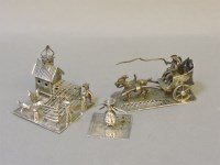 Lot 88 - Three silver miniatures