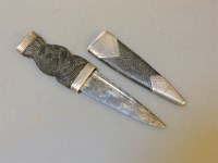 Lot 113 - A silver mounted ebony dirk